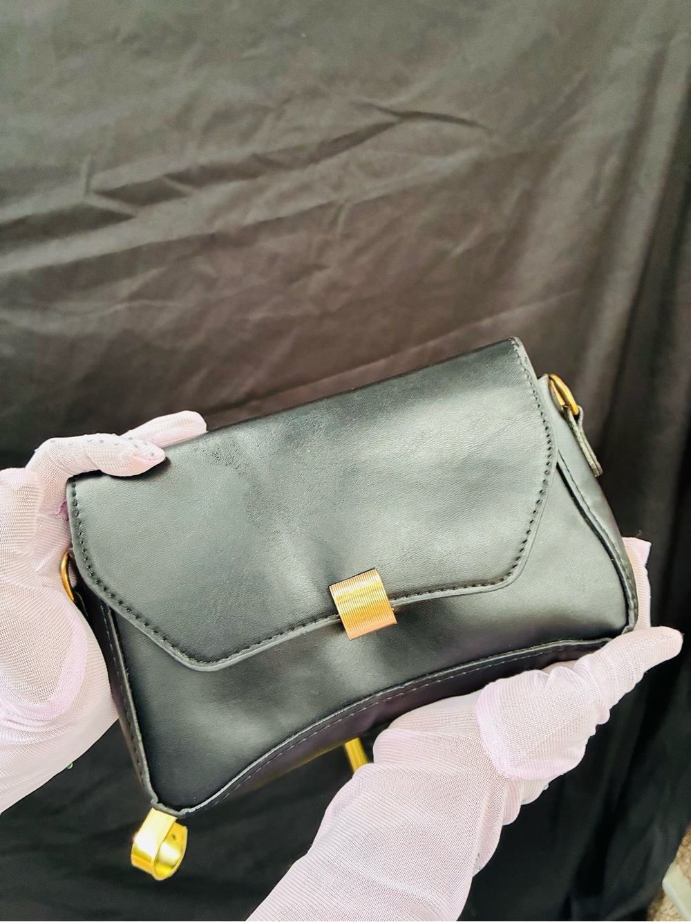 Black Leather Crossbody Bag with Gold Accent
